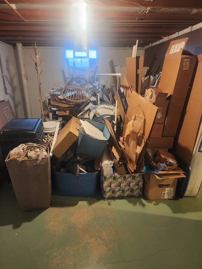 Roll-off dumpster container at job site for Yard Waste Dumpster Rental in Hammond